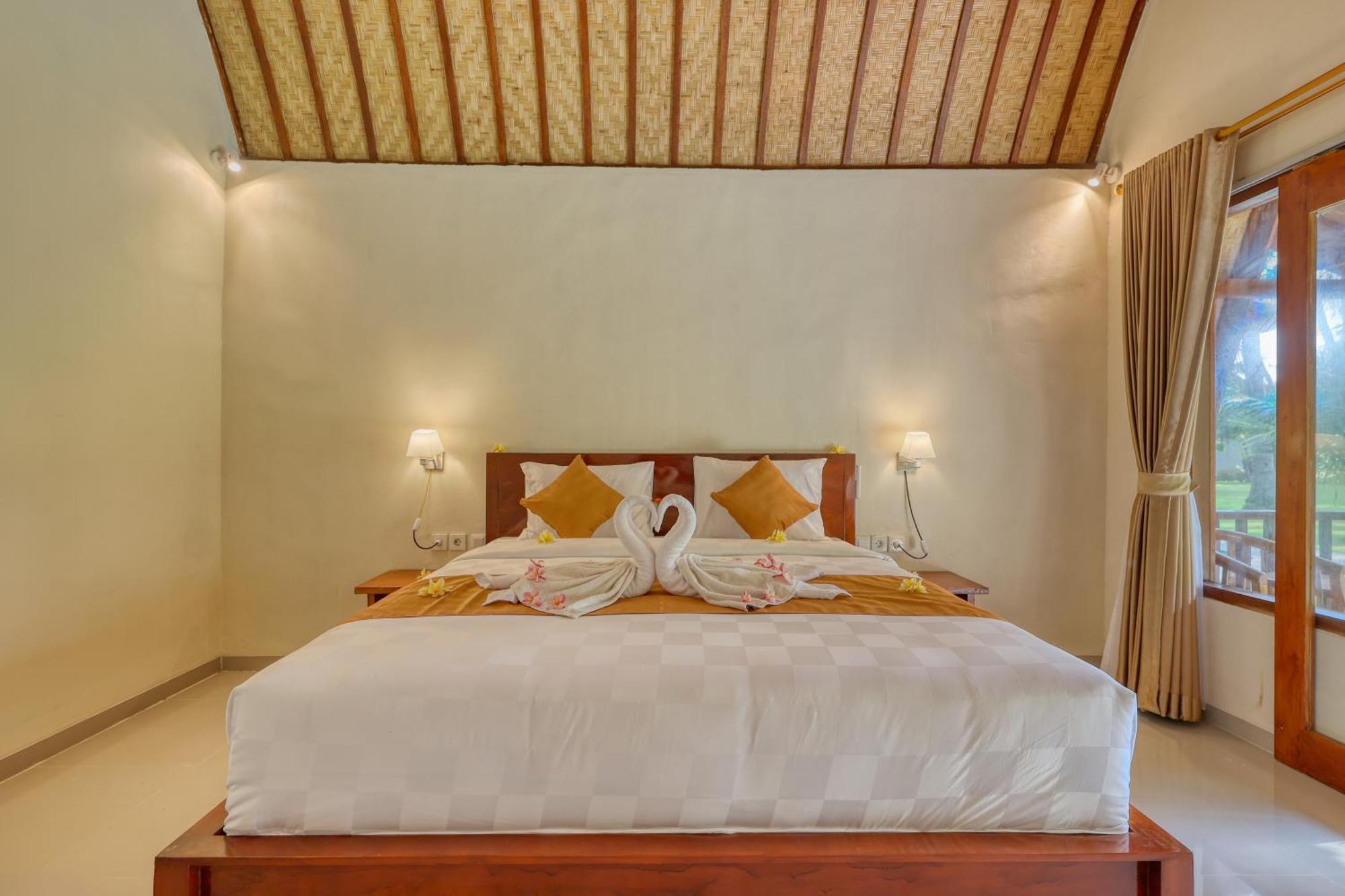 Puri Yalus Bungalow Toyapakeh Zimmer foto